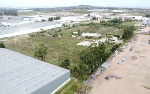 Venta de predio logístico de 9.1 hectáreas frente a Polo Oeste y Ruta 1 en Montevideo - Interra